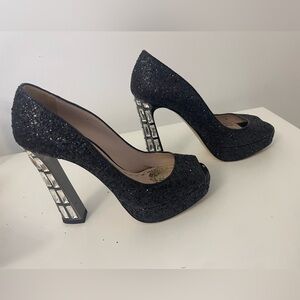 Miu Miu  black high heel embellished, black part sparkly and has diamonds heel